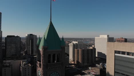 aerial footage of a clock building in downtown minneapolis