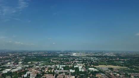 Aerial-POV-of-Bologna-airport-and-runway-arriving-in-a-sunny-morning