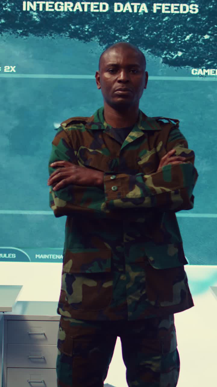 Serious Soldier in Camouflage Uniform Standing in Control Room