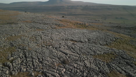 flying over rocky landscape towards hidden valley in english countryside yorkshire uk