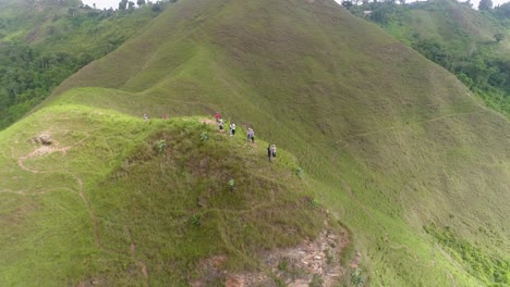 group people climb to enjoy high mountain view, drone turn over, jarillo venezuela