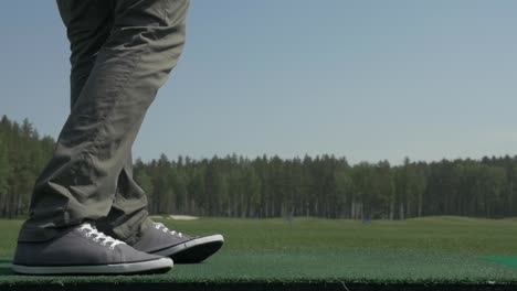 golfer preparing to putt