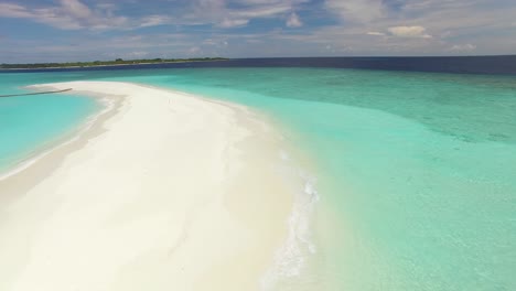 an aerial view shows a sand island on maldives 1