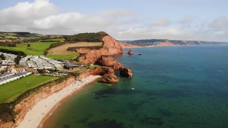 Imágenes-Aéreas-Mirando-Hacia-La-Bahía-De-Ladram-Y-Sidmouth-Devon,-Inglaterra