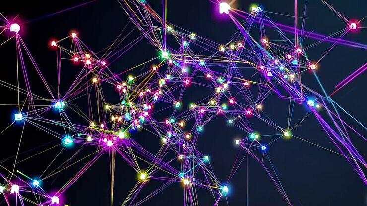 A dynamic video of a glowing network of interconnected nodes and lines, viewed from a high angle