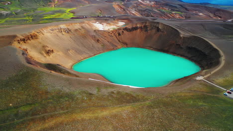 bright blue lake of the viti crater - krafla volcano in north iceland - aerial