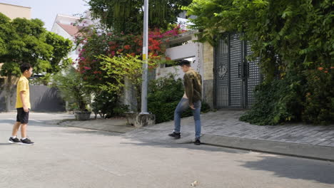 asian man and boy having fun outdoor