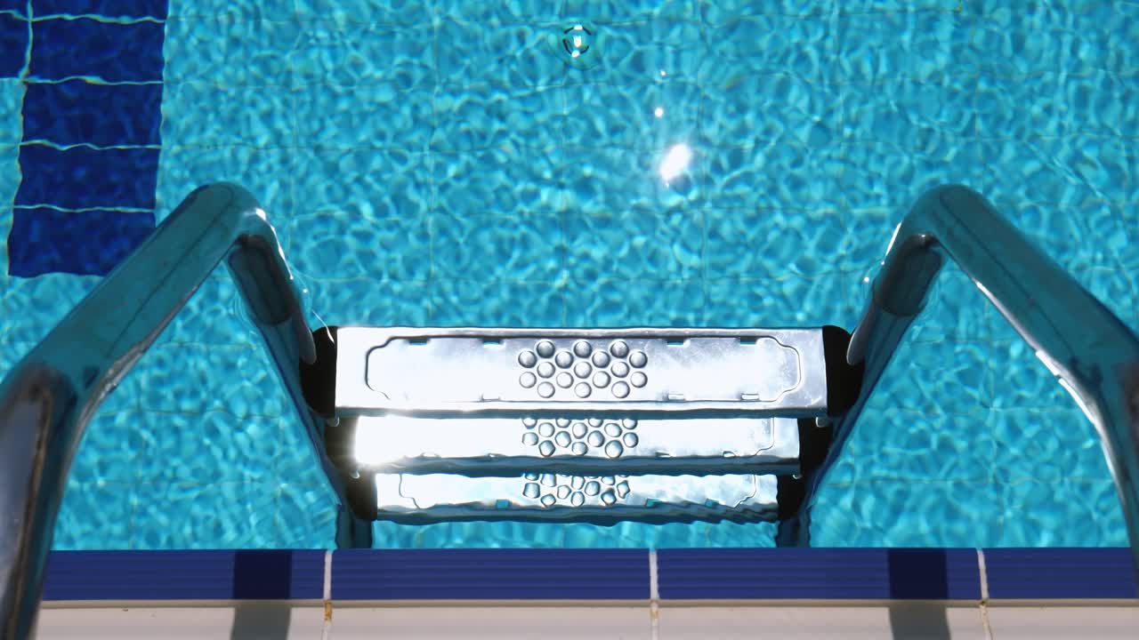 Grab bars ladder in the swimming pool
