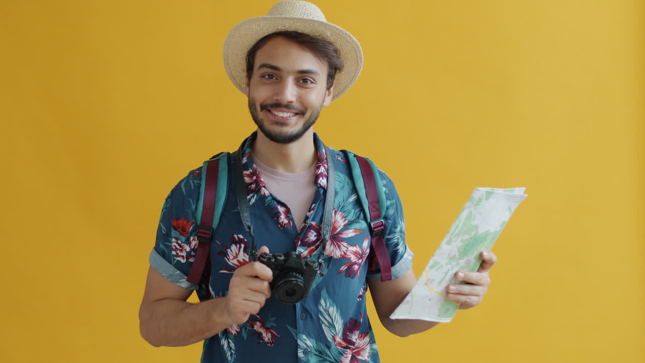 Tourist with Map and Camera