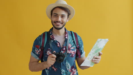 tourist with map and camera