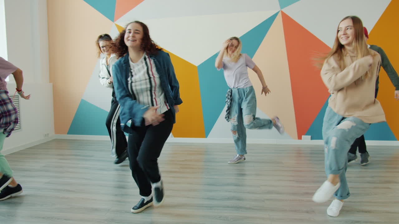Teenagers Dancing in a Dance Studio