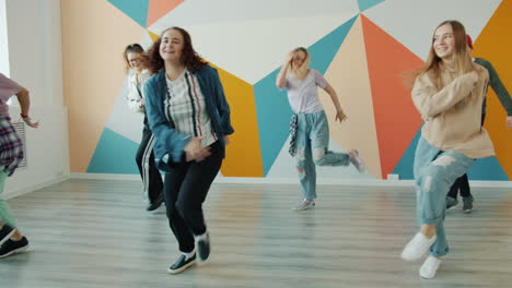 teenagers dancing in a dance studio