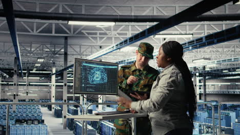 army experts in server room use artificial intelligence program