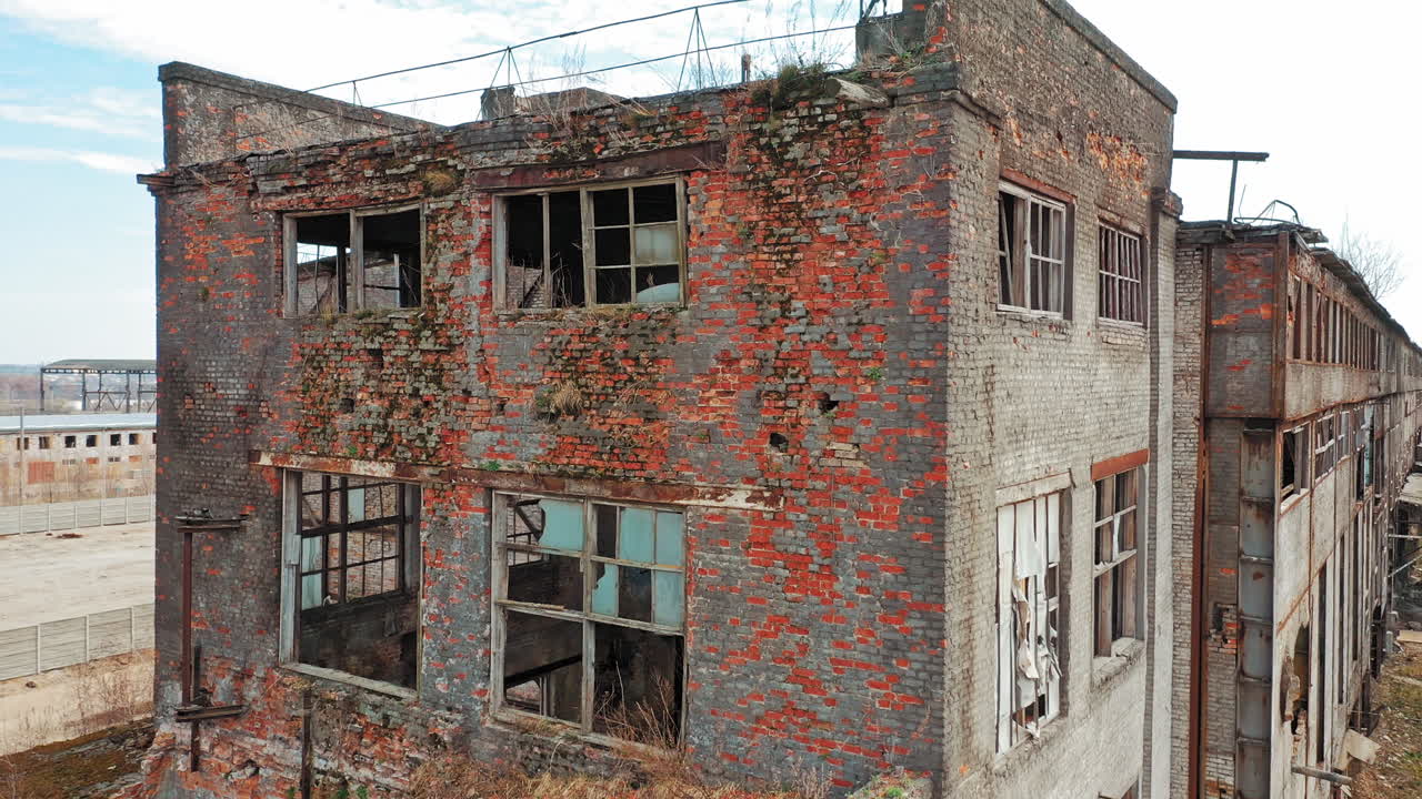 Abandoned ruined industrial factory building, ruins and demolition concept. Aerial view
