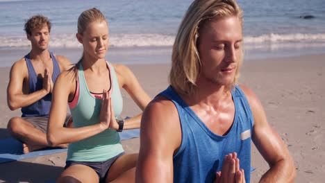 three friends doing yoga