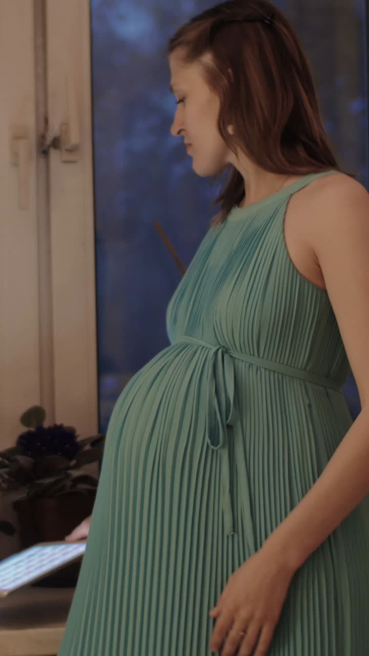 Pregnant woman in dress