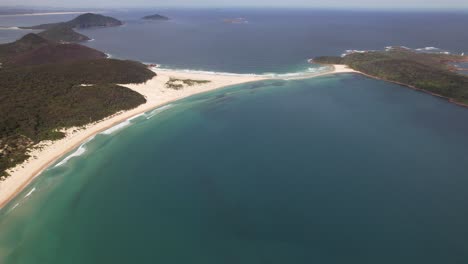 fingal spit - fingal beach and fingal island in new south wales, australia. - aerial shot