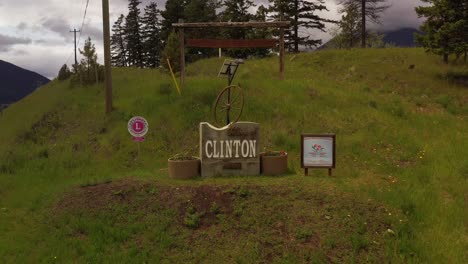 A-Fond-Farewell-to-Clinton:-A-Pullback-Drone-Shot-of-the-Iconic-Town-Sign