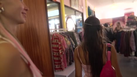 women browsing in a clothing store