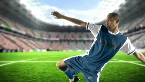 Football player kicking the football