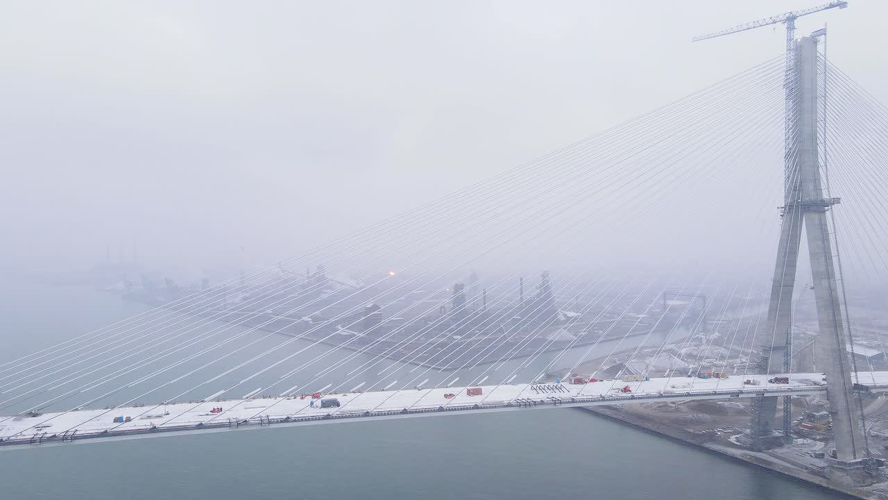 Snowstorm over Gordie Howe Bridge with Zug Island in background