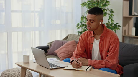 man studying online at home