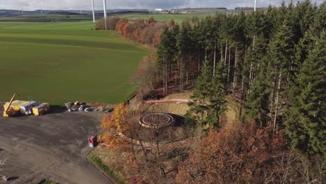 Drone-Rising-Over-Wind-Turbine-Foundation-Under-Construction