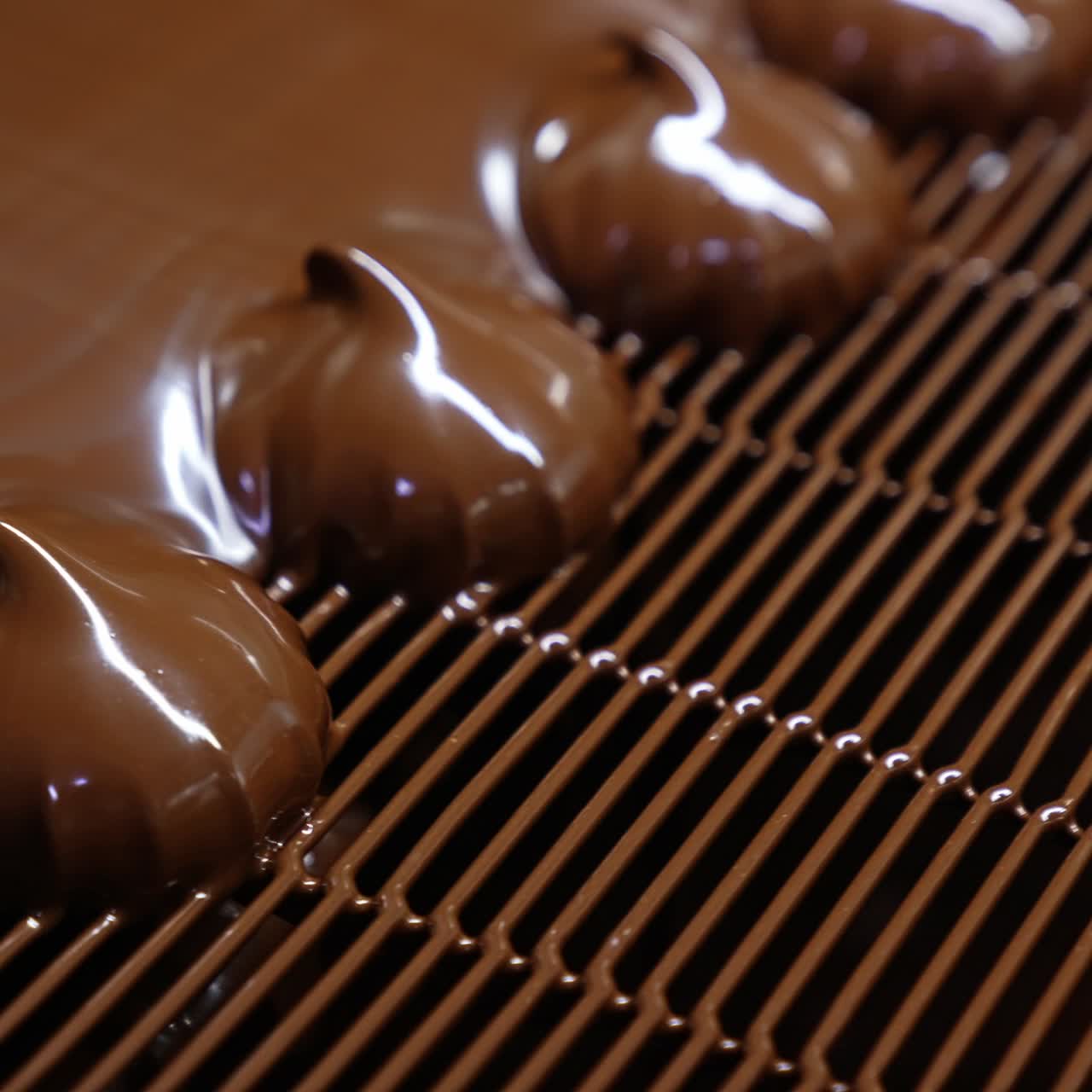 Chocolate Desserts on a Conveyor Belt