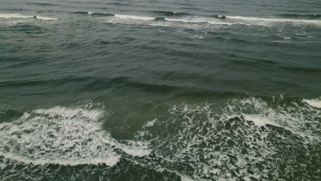 beautiful white waves of wladyslawowo in poland -aerial