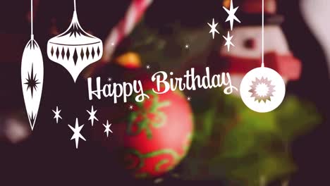 animation of birthday greetings and baubles over christmas decorations