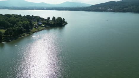 Landscape-of-majestic-Zywiec-lake-in-Beskid-mountains---aerial-view-4K