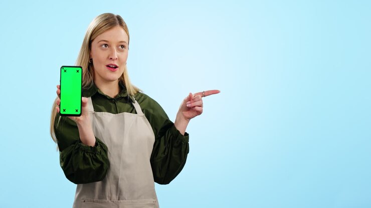 Happy woman, phone and pointing to mockup