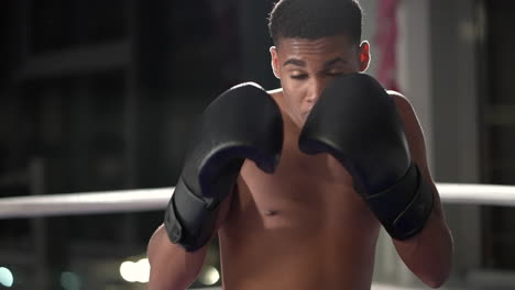 young man boxing in a ring