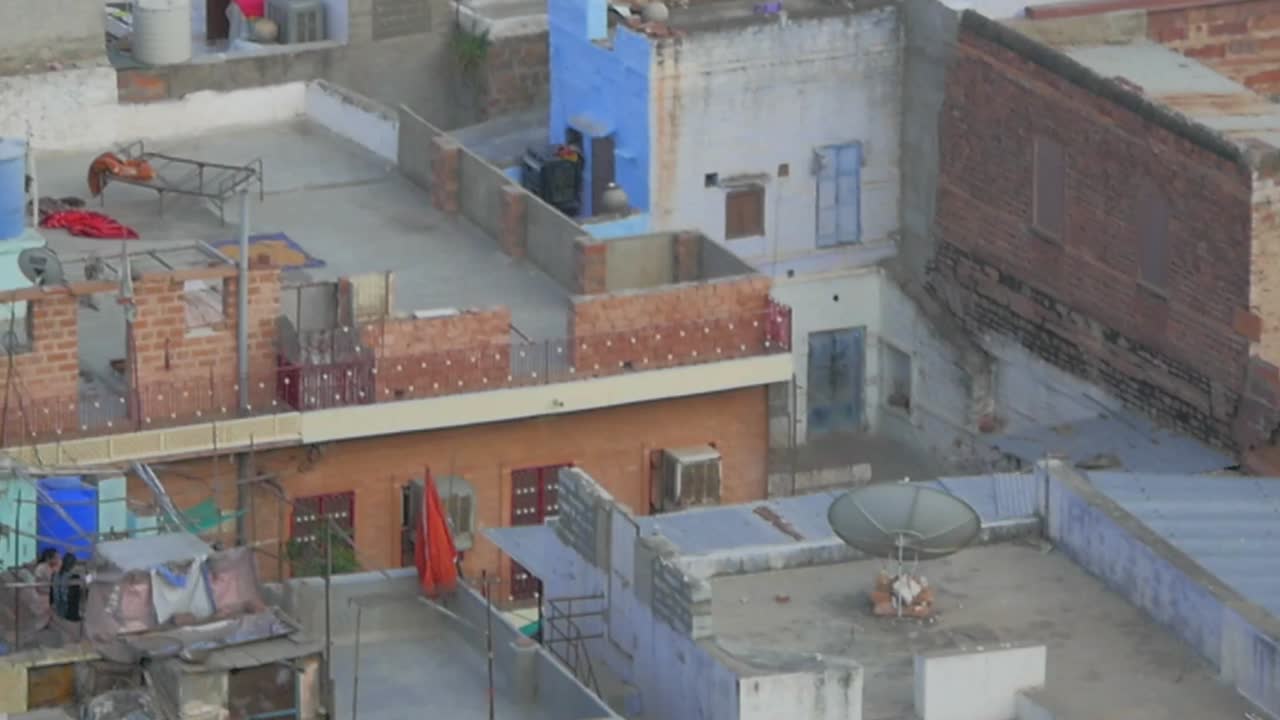 Panning up to see thousand of Jodhpuri homes within the massive city.