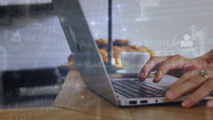 Animation of connections and binary code over hands of woman using laptop