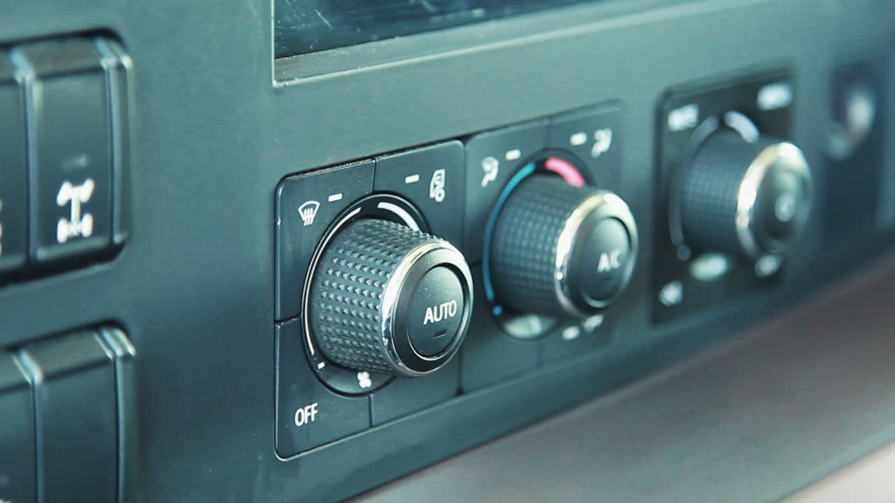 control del clima en el tablero de instrumentos del automóvil