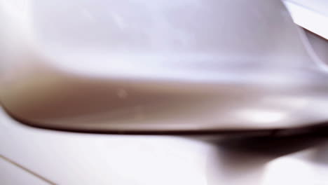 woman in a silver car