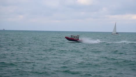 slomo of boat riding through choppy waters