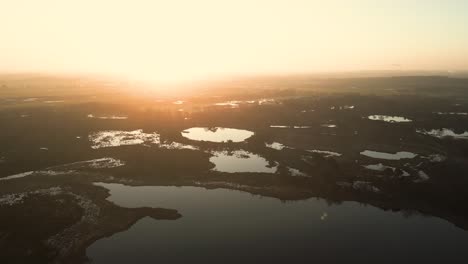 sunrise over a moorland landscape