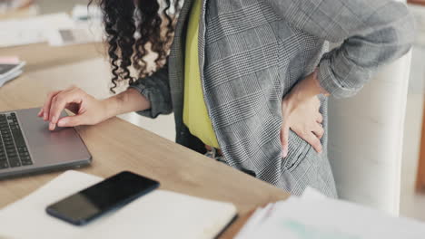 Back-pain,-office-and-hands-of-business-woman