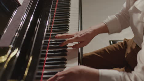 pianist giving concert on stage