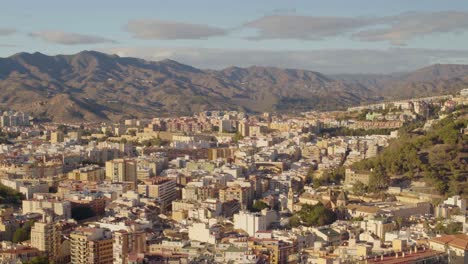 highview of city with beautiful landscape of hills with sunlight, malaga, spain