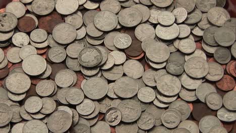 a pile of change sits on a table