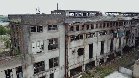 aerial view from the air to an abandoned factory. old industrial building for demolition.