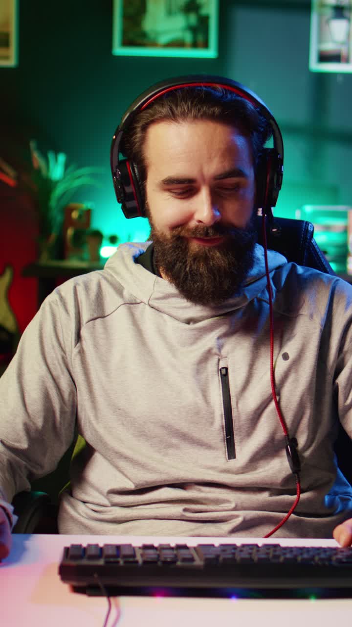 Vertical video Happy gamer talking with friends, celebrating after winning videogame
