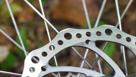 bicycle wheel brake disc and spokes rotating slow motion