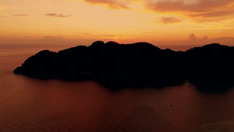amazing colorful sunset behind an island