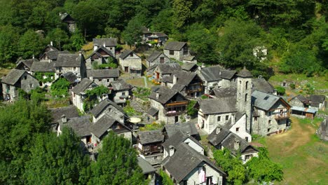 Aerial-drone-Flying-Towards-the-Swiss-town-Foroglio-during-Summer