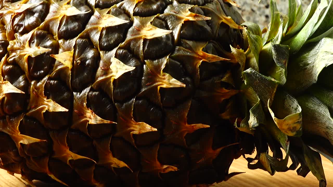 Pineapple, shooting in the movement. Healthy food