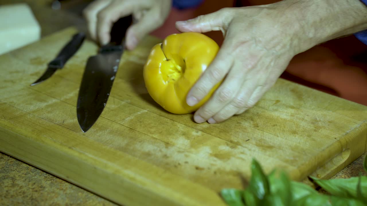 Preparing Yellow Bell Pepper on a Cutting Board